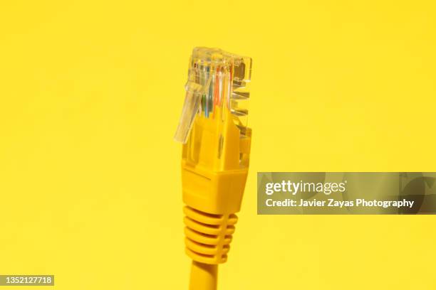 yellow ethernet cable on yellow - ethernet-cable-colors stock pictures, royalty-free photos & images