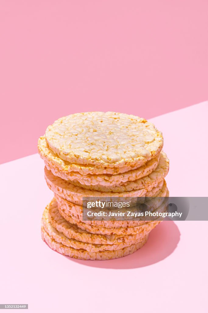 Stack Of Rice Cakes On Pink Background