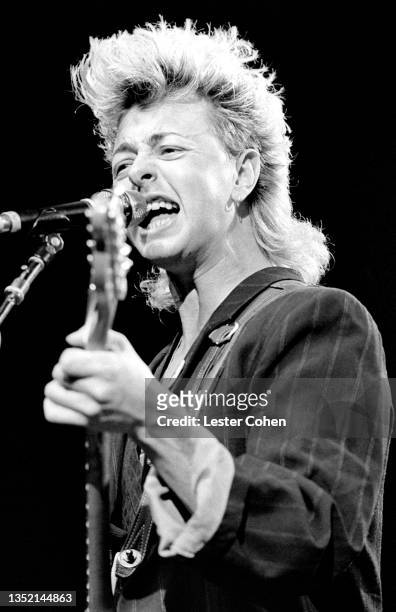 American blues singer, guitarist, songwriter, and activist Brian Setzer performs on stage during a concert circa 1988 in Los Angeles, California.