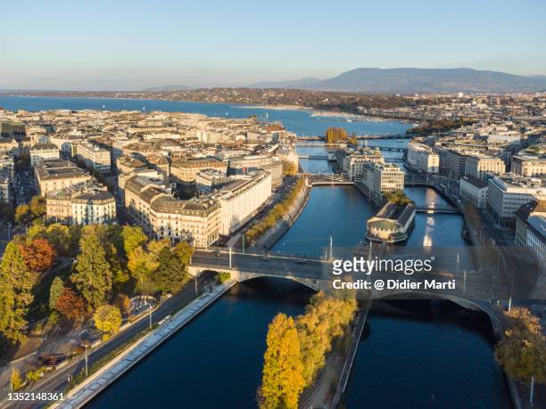 aerial view of the rhone river that flow in the heart of geneva, switzerland - rhone river stock pictures, royalty-free photos & images