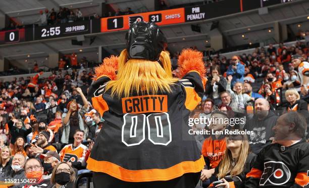 Gritty the mascot of the Philadelphia Flyers entertains the crowed during an NHL game against the Arizona Coyotes at the Wells Fargo Center on...