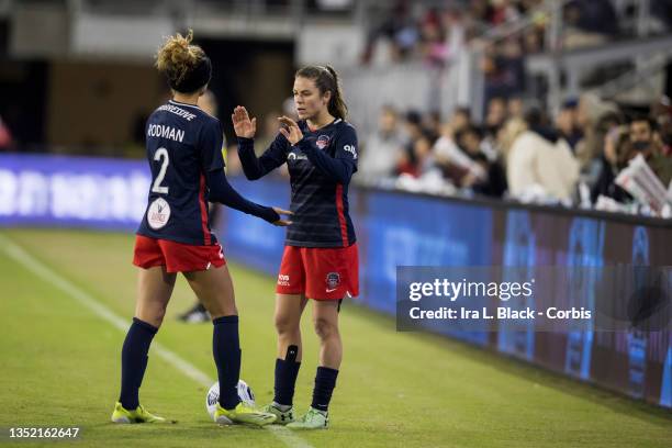 Trinity Rodman of Washington Spirit gets a pat from Kelley O'Hara of Washington Spirit as she is subbed out in overtime of the NWSL Quarterfinals...