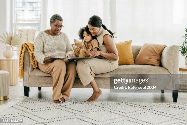 make learning to read fun - multi generation family black stock pictures, royalty-free photos & images