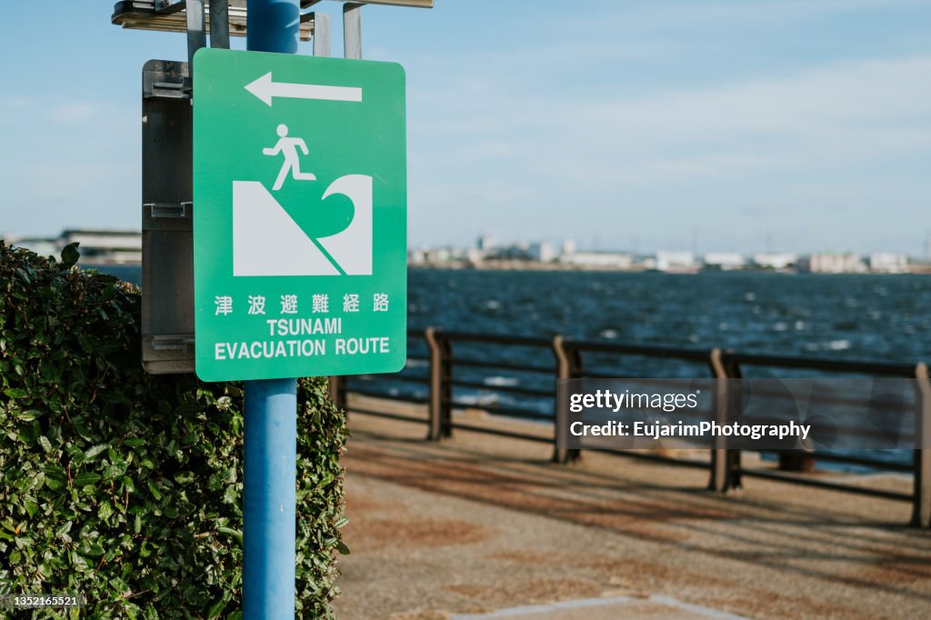 Close up of tsunami evacuation route sign