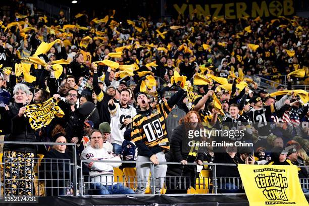 Pittsburgh Steelers fans wave terrible towels during the second half of the game against Chicago Bears at Heinz Field on November 8, 2021 in...