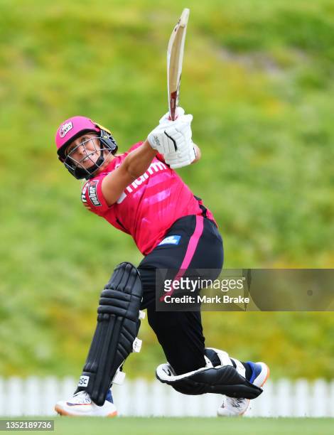 Ashleigh Gardner of the Sydney Sixers hits a six during the Women's Big Bash League match between the Sydney Sixers and the Brisbane Heat at Karen...