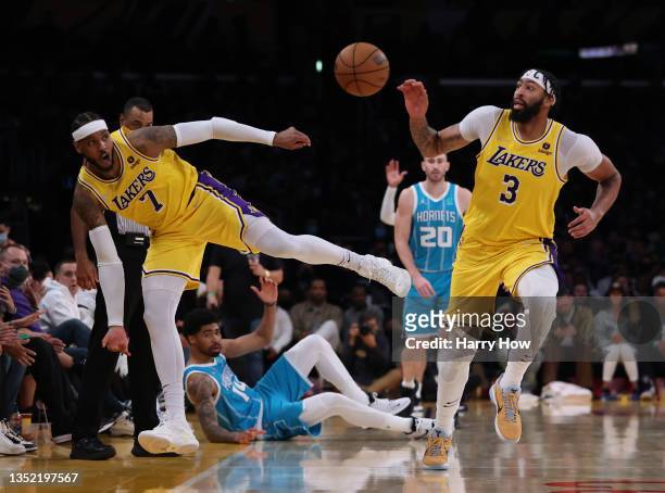Carmelo Anthony of the Los Angeles Lakers saves the ball from going out of bounds to Anthony Davis leading to a fast break score during a 126-123...