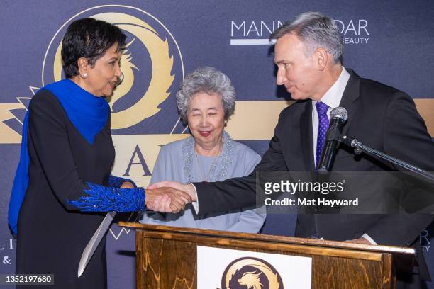 Indra Nooyi, Karen Wong, and Dow Constantine speak during the Asian Hall of Fame induction reception at Ben Bridge Jeweler on November 08, 2021 in...