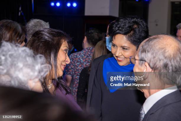 Indra Nooyi speaks with Manka Dhingra and Jon Bridge during the Asian Hall of Fame induction reception at Ben Bridge Jeweler on November 08, 2021 in...