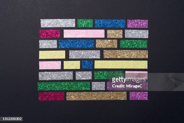 multi colored glitter short stripes of adhesive tapes - short à paillettes photos et images de collection