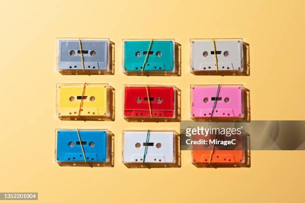colorful cassette tapes in transparent boxes - memories box stock pictures, royalty-free photos & images