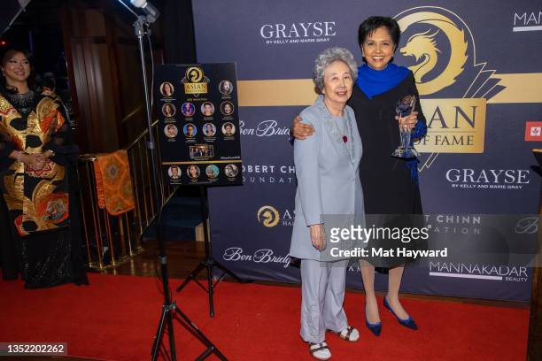 Karen Wong and Indra Nooyi attend the Asian Hall of Fame induction reception at Ben Bridge Jeweler on November 08, 2021 in Seattle, Washington.
