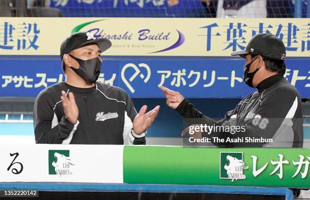 Head coach Tadahito Iguchi of the Chiba Lotte Marines celebrates as the team goes through to the second stage after the 4-4 draw during the Pacific...