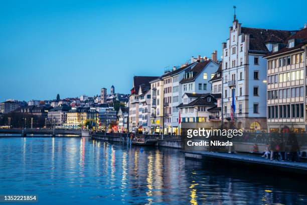 zurich, switzerland cityscape from limmat river - lake zurich switzerland stock pictures, royalty-free photos & images