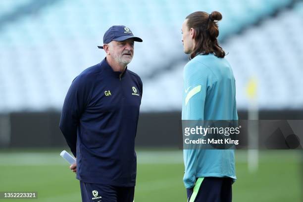 Socceroos head coach Graham Arnold speaks to Jackson Irvine during a Socceroos training session at Stadium Australia on November 09, 2021 in Sydney,...