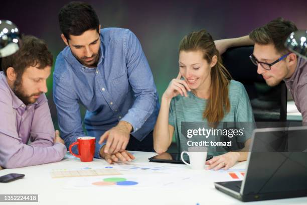 young creative team meeting - ico stock pictures, royalty-free photos & images