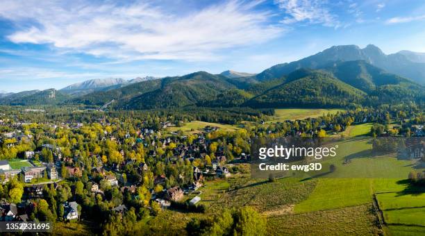 holidays in poland - aerial view of the zakopane and tatra mountains - tatra mountains stock pictures, royalty-free photos & images