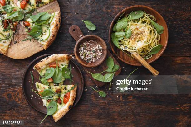 vegetarian dishes - wood dish stock pictures, royalty-free photos & images