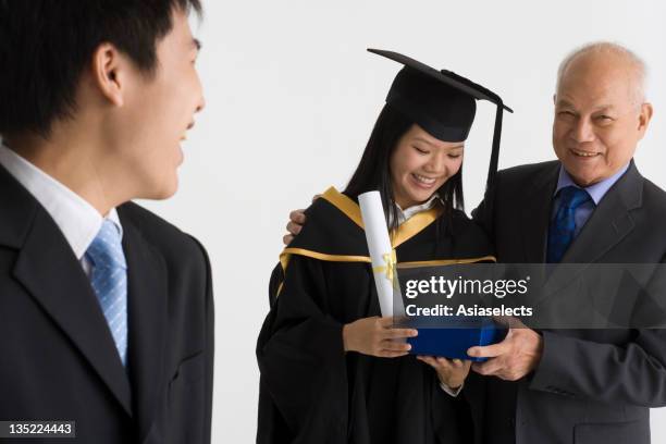 Graduation Received Graduation Ceremony And Receiving Diploma Photos and Premium High Res ...