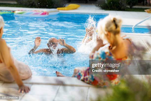 Senior Pool Fun 738 Seniors Splashing In Pool Stock Photos, High-Res Pictures, and ...