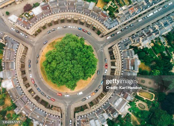 an aerial view of a traffic circle in the city of bath, uk - stock photo - traffic circle stock pictures, royalty-free photos & images