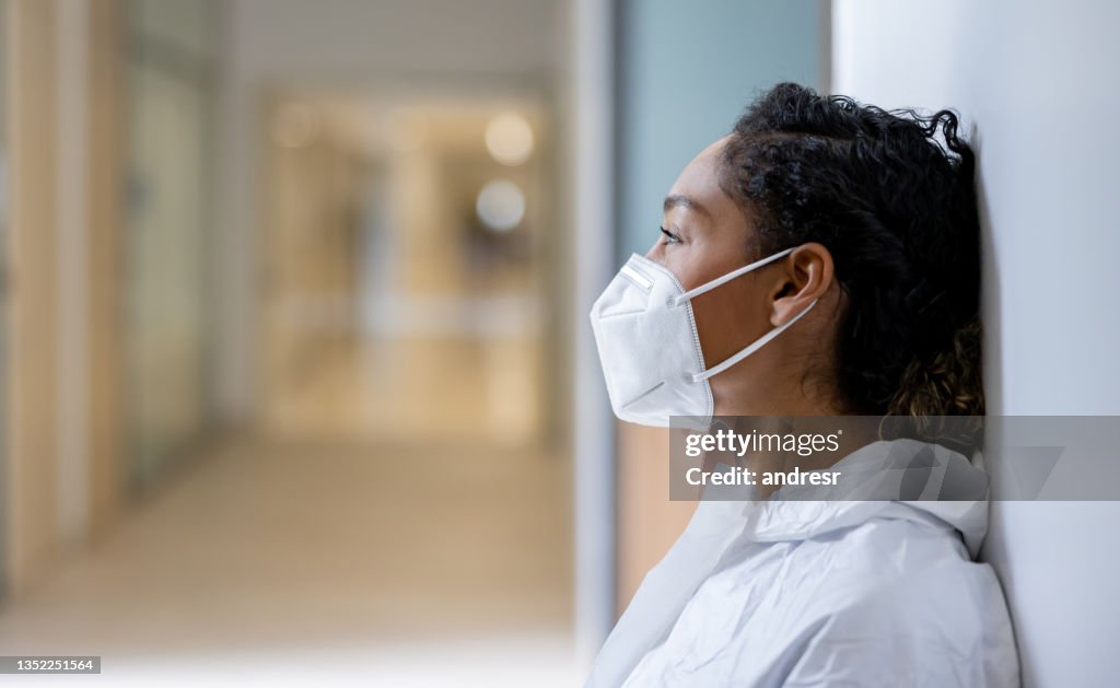 Healthcare worker taking a break while working at the hospital during the pandemic