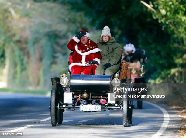 Participants seen driving a 1904 Oldsmobile during the annual London to Brighton Veteran Car Run on November 7, 2021 in Staplefield, West Sussex,...