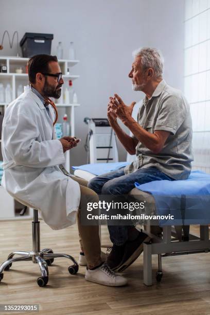 medical expertise that puts every patient at ease - old cough stock pictures, royalty-free photos & images