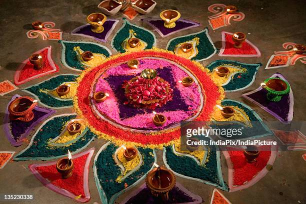 traditional colourful rangoli - rangoli stock-fotos und bilder