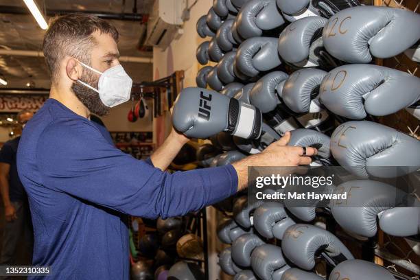 Mixed martial arts fighter and sports analyst Michael Chiesa is seen as Modelo, UFC and Rebuilding Together renovate Cappy's Boxing Gym on November...