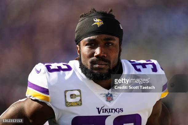 Dalvin Cook of the Minnesota Vikings looks on before the game against the Baltimore Ravens at M&T Bank Stadium on November 7, 2021 in Baltimore,...