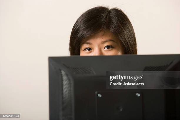 Woman Head Over Computer Screen 48 Peaking Over Computer Stock Photos, High-Res Pictures, and Images ...