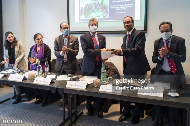 Charu Lata, Suruchi Bhadwal, Kamal Kishore, Manish Bapna, Jeevan Kumar Jethani, and Arunabha Ghosh at the NRDC COP26 India Hybrid Event: Changing the...