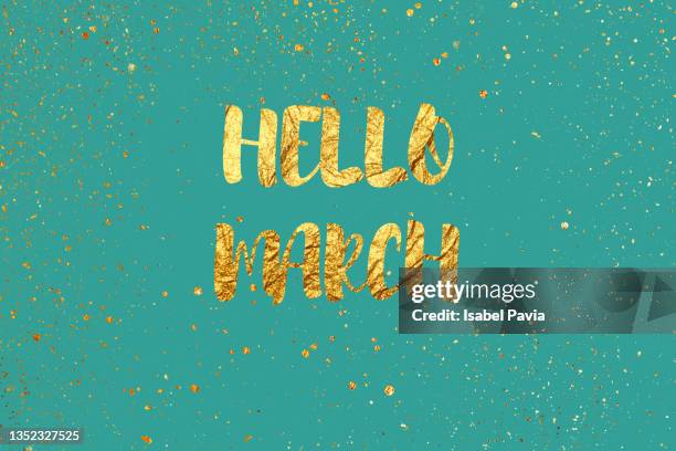 "hello march" message in golden words - march month stock pictures, royalty-free photos & images