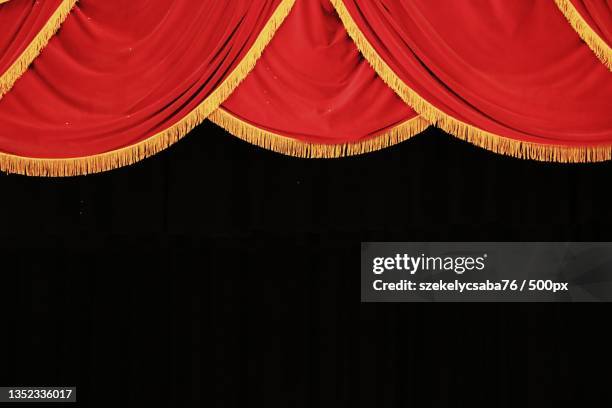 close-up of red curtain hanging against wall - opéra style musical photos et images de collection