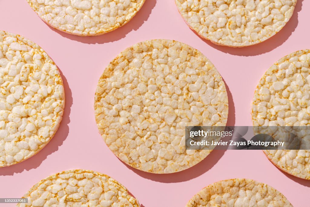 Some Rice Cakes On Pink Background