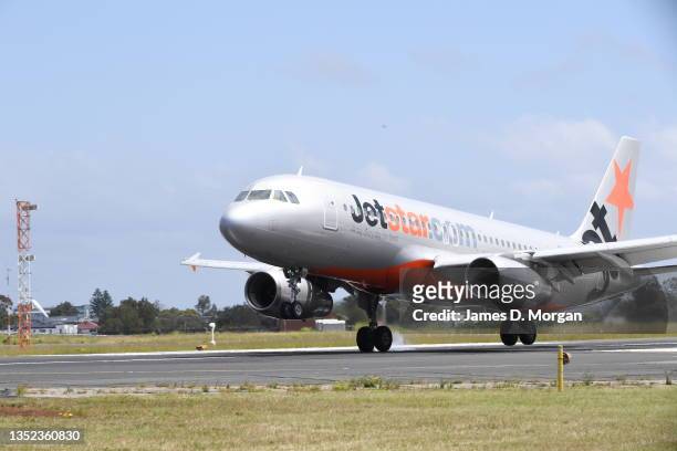 Jetstar aircraft lands at Sydney Airport on November 09, 2021 in Sydney, Australia.
