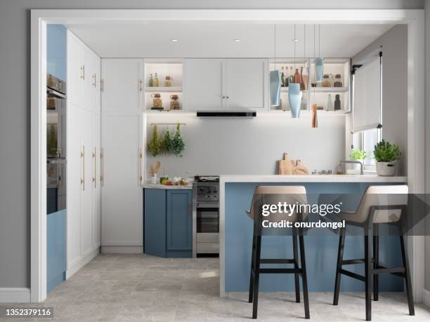 moderne küche interieur mit kücheninsel, blauen und weißen schränken und stühlen - kitchen stock-fotos und bilder