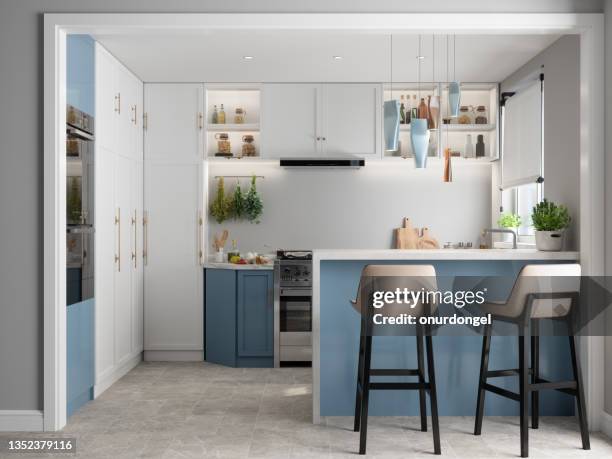 interior de cocina moderna con isla de cocina, gabinetes y sillas azules y blancas - cocina fotografías e imágenes de stock