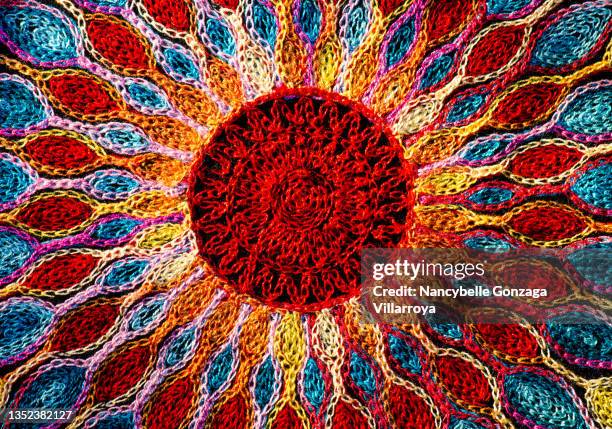 elegant fine ornate and colourful embroidery on black fabric - embroidery stock pictures, royalty-free photos & images