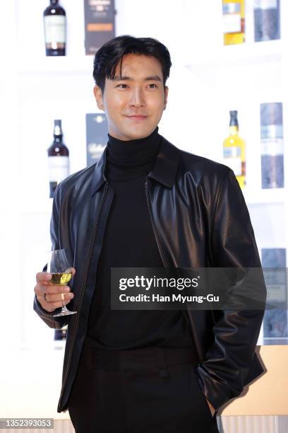 Choi Si-Won aka Siwon of South Korean boy band Super Junior attends the photocall for Pernod Ricard Korea Ballantine's blended scotch whisky 'Time...