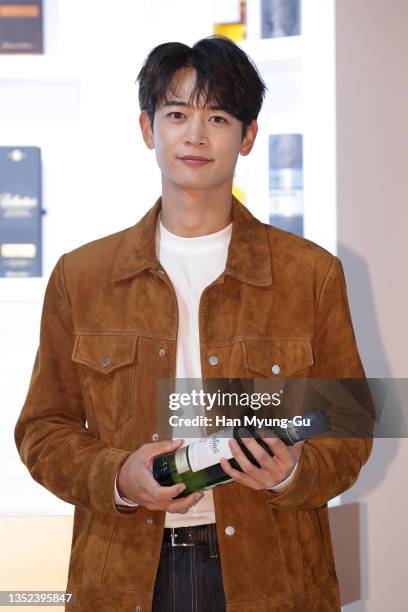 Minho of South Korean boy band SHINee attends the photocall for Pernod Ricard Korea Ballantine's blended scotch whisky 'Time Slowing Experience'...