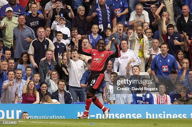 Dwight Yorke of Blackburn celebrates and receives the abuse from the home crowd after scoring during the Barclaycard Premiership match between...