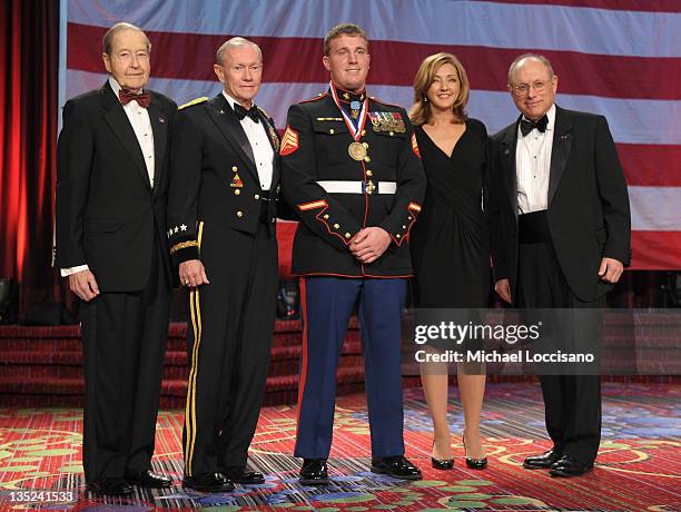 Oliver Mendell, Martin E. Dempsey, Marine of the year Dakota Meyer, Chris Jansing and Myron Berman pose onstage at the 50th USO Armed Forces gala &...