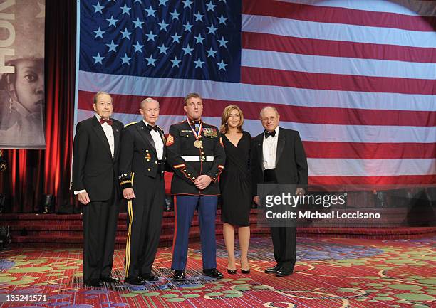 Oliver Mendell, Martin E. Dempsey, Marine of the year Dakota Meyer, Chris Jansing and Myron Berman pose onstage at the 50th USO Armed Forces gala &...