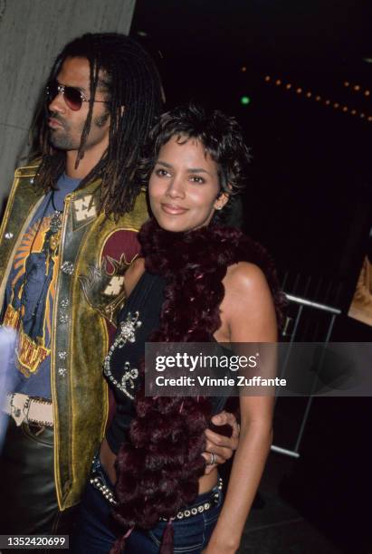 American actress Halle Berry and her husband, American singer-songwriter and actor Eric Benet attend the Century City premiere of 'The Brothers' held...