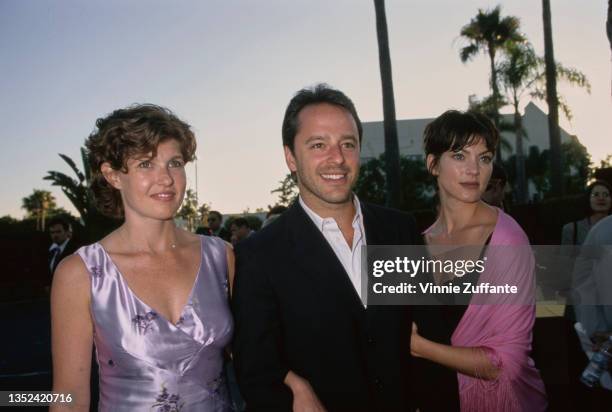 American actress Connie Britton, Canadian actor Gil Bellows and his wife, American actress Rya Kihlstedt, wearing a pink shawl, attend the Hollywood...