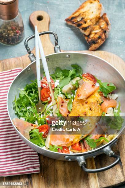 omelette with smoked salmon and feta cheese - omelette stock pictures, royalty-free photos & images