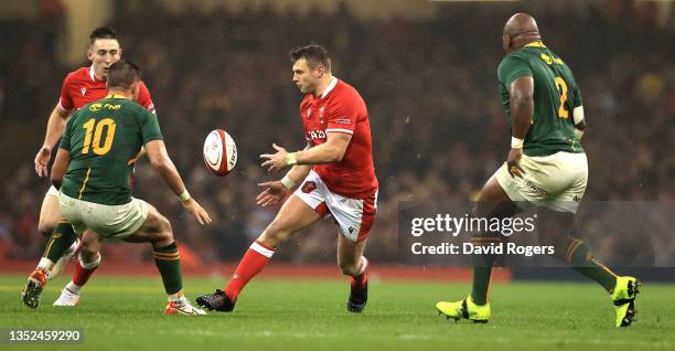 Dan Biggar of Wales off loads the ball during the Autumn Nations Series match between Wales and South Africa at the Principality Stadium on November...