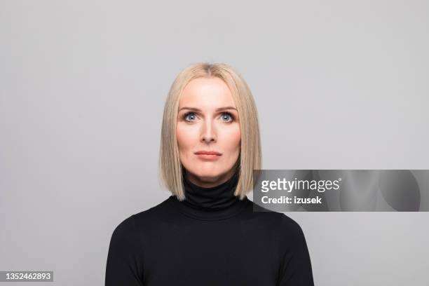 headshot of confident mature businesswoman - white polo stock pictures, royalty-free photos & images
